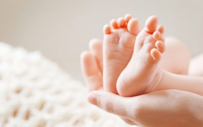 Baby Feet being held by a hand