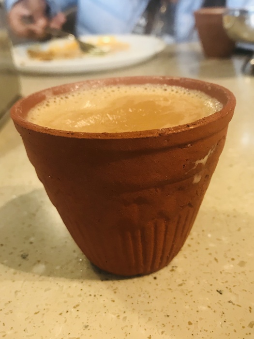 Cup of chai tea in an earthenware mug